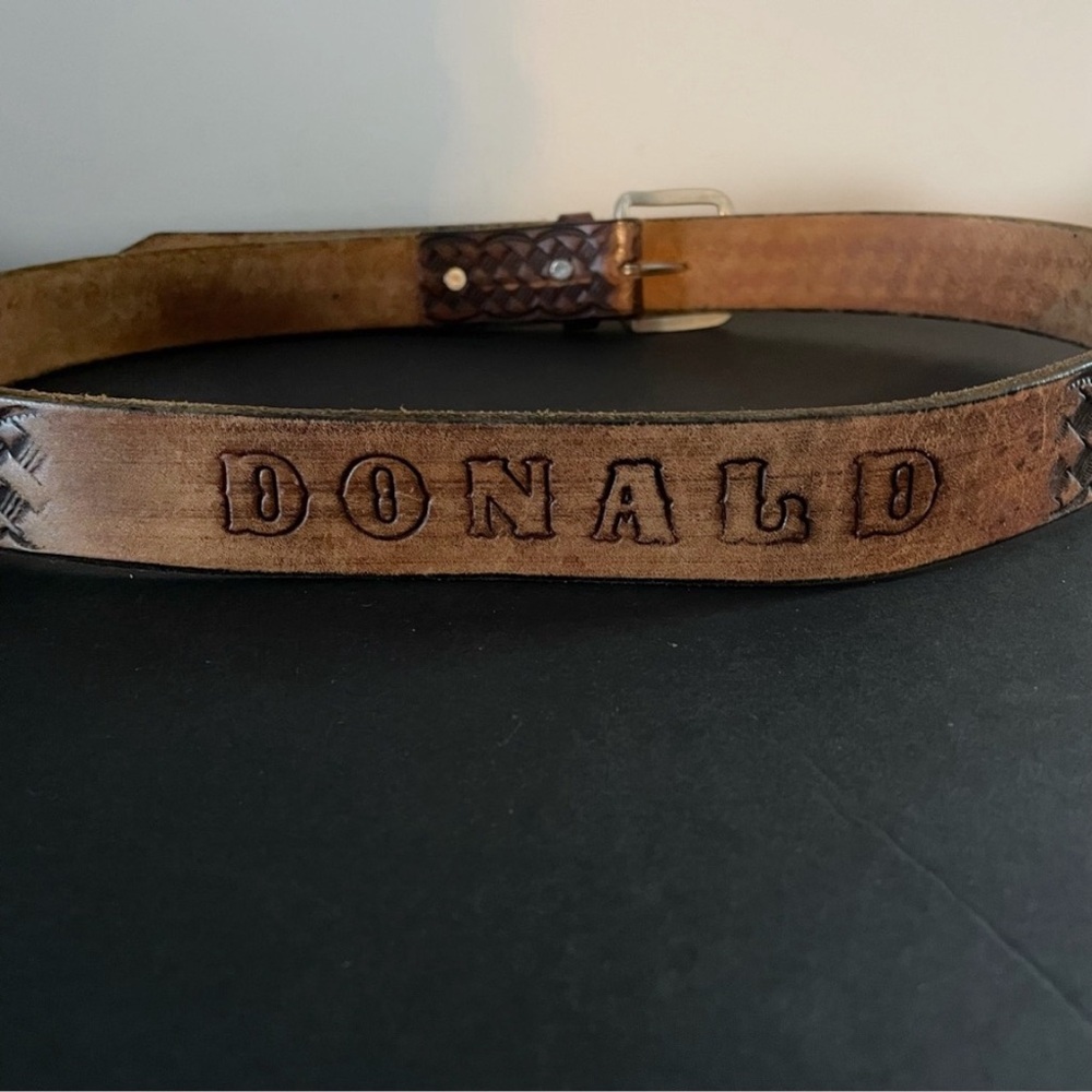 Donald embossed name leather belt size 40